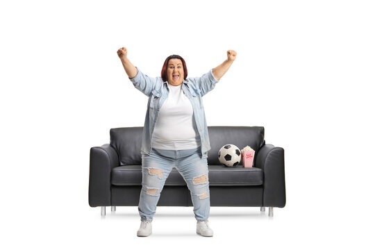 Happy corpulent woman cheering with hands up