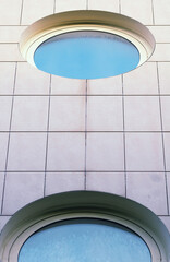 Modern architecture. Close up of some round windows in a financial building