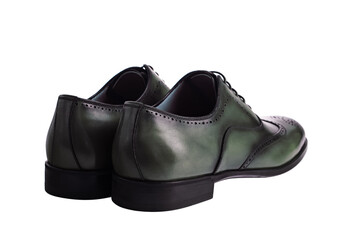 Dark green leather men's shoes isolated on white background. Fashion classical polished men's green oxford brogues.