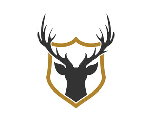 Deer head inside the golden shield vector logo