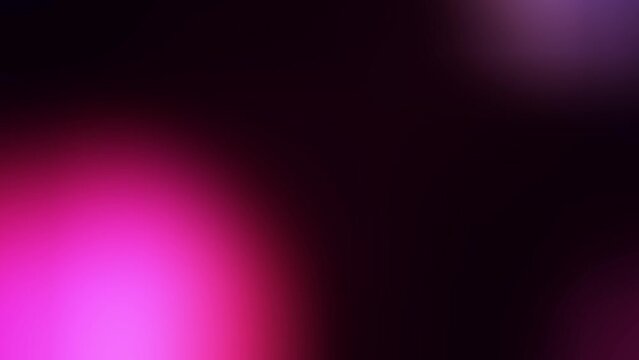 Blurred flickering lights in motion on a black background. Stock effect for overlaying blowouts on a clip. 4k abstract video.