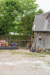 barn and warehouse of old things in the backyard in the village  