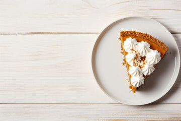 Decorated fresh pumpkin pie on wooden background