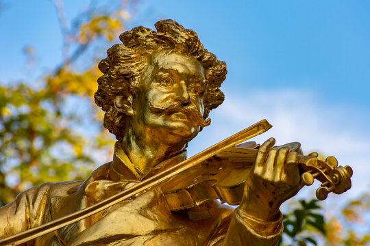 Monument to composer Johann Strauss in Stadtpark in autumn, Vienna, Austria
