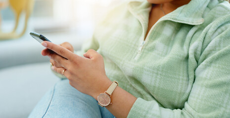 Home, closeup and woman with a cellphone, typing and connection with social media, relax and network. Person, apartment or girl with a smartphone, mobile user and contact with digital app or internet