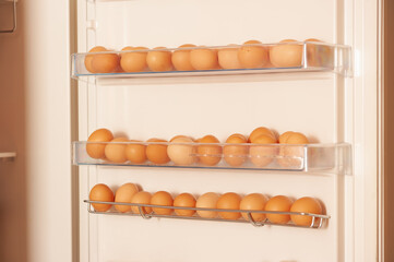 There are a lot of chicken eggs in the refrigerator. A source of cheap protein for food
