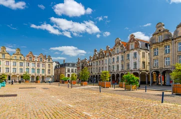 Arras cityscape with Flemish-Baroque-style townhouses buildings on La Grand Place square in old town center, blue sky in summer day, Pas-de-Calais department, Hauts-de-France Region, Northern France