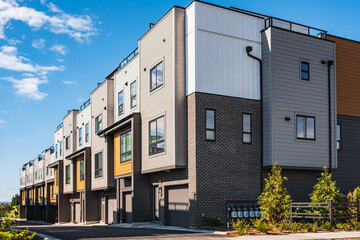 New Modern Apartment Buildings in Vancouver BC. Canadian modern residential architecture. New townhouses on a sunny day