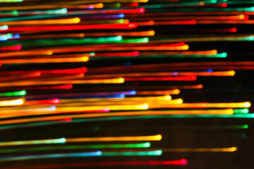 Long-Exposure of Lateral Laser-Like Light Trails Against a Black Background