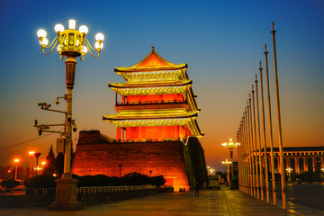 View of the historic gate in Beijing's city wall located at the south of Tiananmen Square at sunset in Beijing, China.  - 657836389