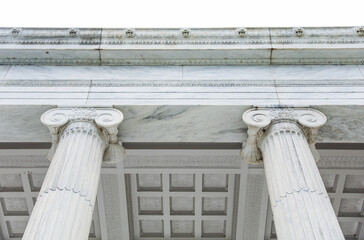 Greek columns, bathed in golden sunlight, evoke timeless grandeur and architectural mastery