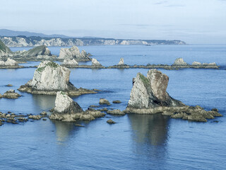 Fototapeta na wymiar Asturian Coastal Majesty: The Serenity and Rugged Beauty of Silence Beach in Northern Spain