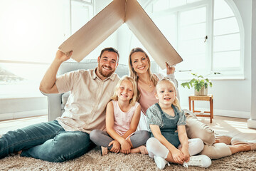 Happy family, portrait and cardboard roof for real estate, moving in or property investment at new...
