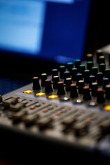 Detailed photo with knobs on a audio mixer desk soundboard - 657844924