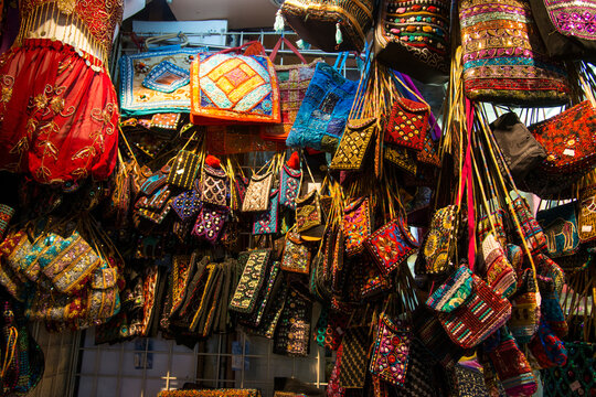 Hanging bags of many sizes, shapes and colors in a local market; Muscat, Oman