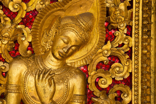 Gilded wall carvings at Wat Xieng Thong Monastery; Luang Prabang, Laos