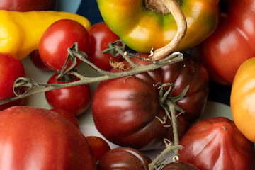 Ripe red tomatoes on a table.