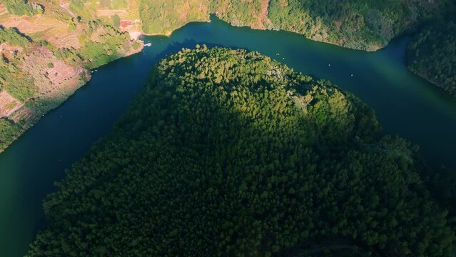 Sailing On Serene River Of Minho Near Belesar Village In Ribeira Sacra, Galicia Spain. Aerial Drone Shot