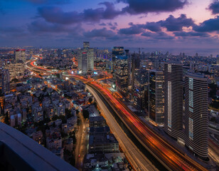 Tel Aviv big city night aerial view. Ayalon highway