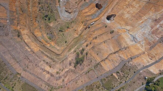 Aerial: Top down view of the Martha open cast mine in waihi, New Zealand