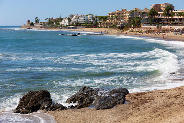 The sea coast with its architecture, beaches and mood with blue sky in Mijas, Andalusia, Spain