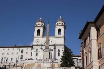 Fototapeta na wymiar Spanish steps and Trinita dei Monti church in Rome, Italy