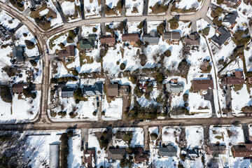 Enjoy a mesmerizing drone view of Oro-Medonte, Port Severn, Midland, Victoria Harbour, Sturgeon Bay, Robins Point, Port McNicoll, and a frozen lake on a foggy winter day. The misty landscape creates a