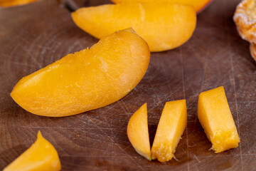 fresh juicy peach on the table, close up
