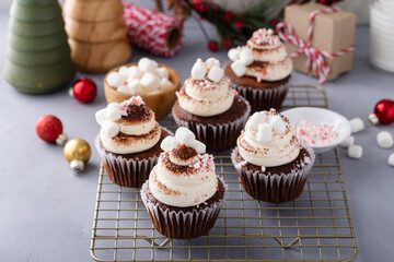 Hot chocolate cupcakes with whipped cream frosting and marshmallows