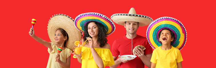 Dancing senior man in sombrero hat on color background