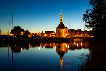 Obraz premium Historical Hoofdtoren tower in the harbor of Hoorn town. North Holland. Netherlands