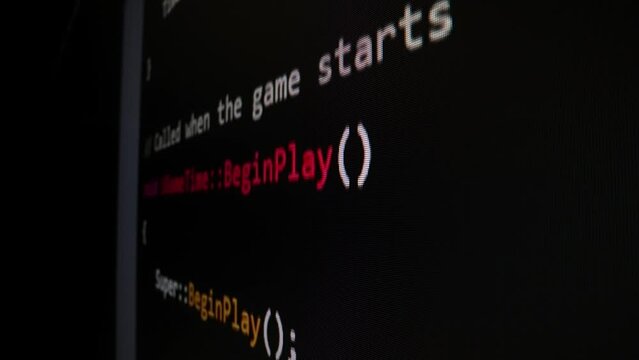 Closeup macro shot movement of coding script moving across LED screen with real-time AI-generated typing, showcasing advanced AI learning in optimization, debug and coding for software development.