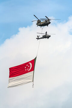 Singapore - July 26 2020: State Flag flypast by RSAF helicopters for NDP at Singapore.