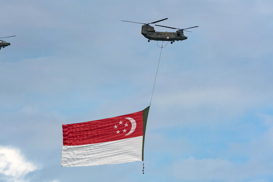 Singapore - July 26 2020: State Flag flypast by RSAF helicopters for NDP at Singapore.