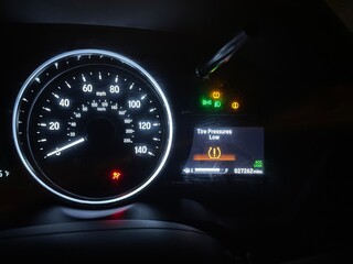 car dashboard with speedometer