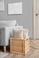 Basket with pillows in living room