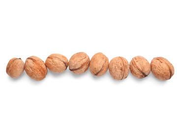 Whole walnuts on white background
