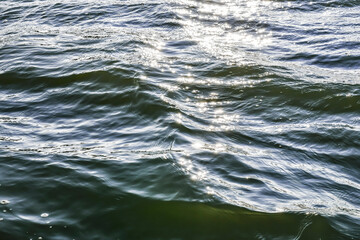 Glisten on blue waves