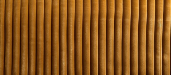 Textured velveteen fabric in khaki Corduroy upholstery for furniture interior design Close up ridge texture background wallpaper