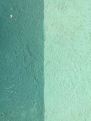 Bright colored textured painted wall in Oaxaca, Mexico