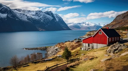 Papier peint photo Villes / Voyage Norwegian landscape with old redwood barns at the sea coast  © sirisakboakaew