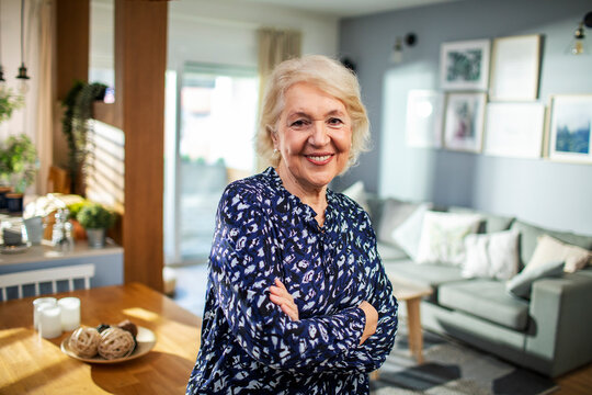 Portrait of senior woman posing at her home