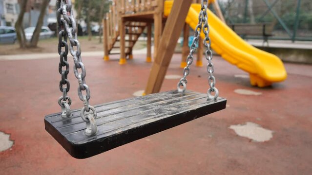 Close-up of a baby swing in the playground
