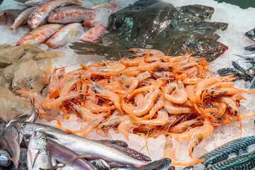 Shrimps and fish for sale at a market in Barcelona, Spain
