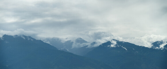 Fototapeta na wymiar Jade Dragon Snow Mountain covered with fog