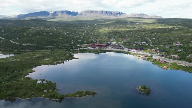 Geilo Town, Ustedalsfjorden and Winter Sport Ski Area during summer in Viken, Norway - Aerial Circling