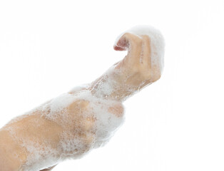 Woman rubbing wrist on white background