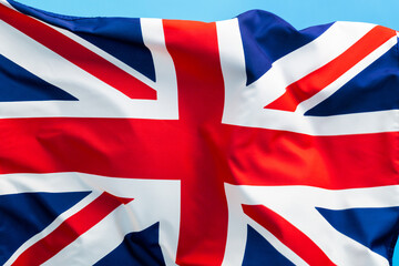 British flag waving on blue background
