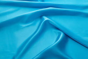 Close up of light blue silk background