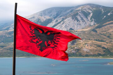 Albanian Flag on a Coastal Mountain